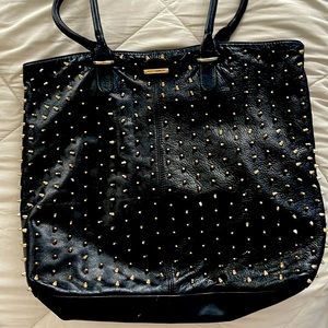 This cute Rebecca Minkoff bag with gold spike hardware. Lightly used